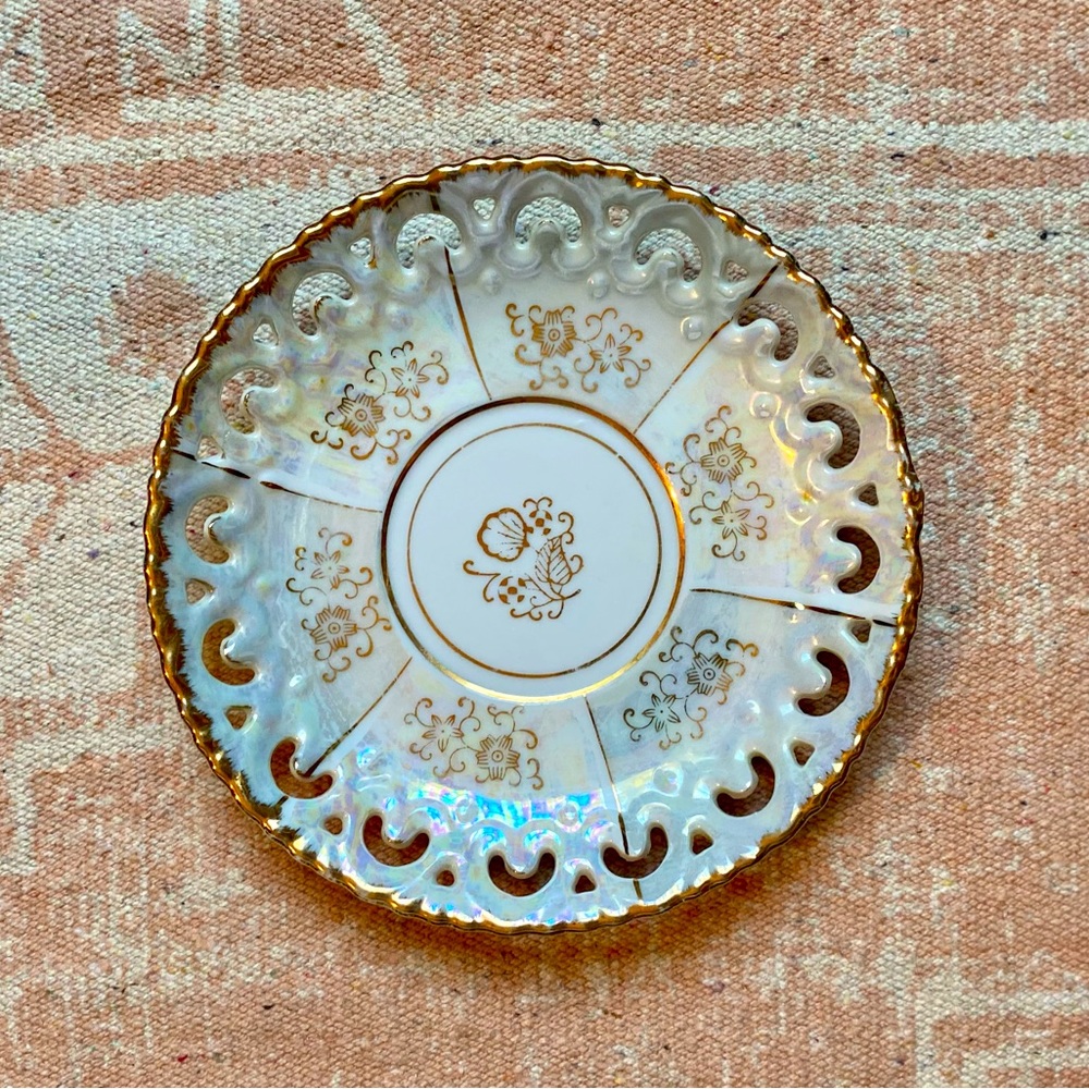 Small vintage iridescent gold trimmed plate